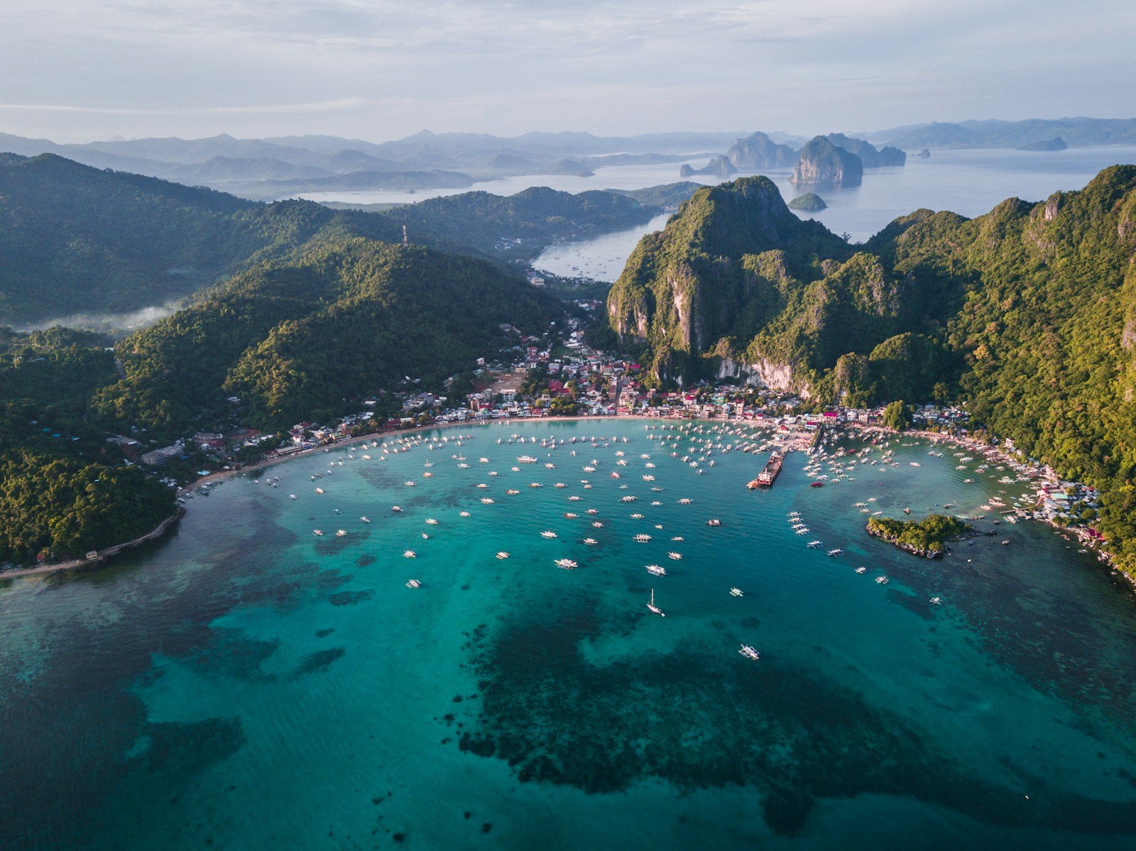 asia tour travel guide landscape photography of island with boats
