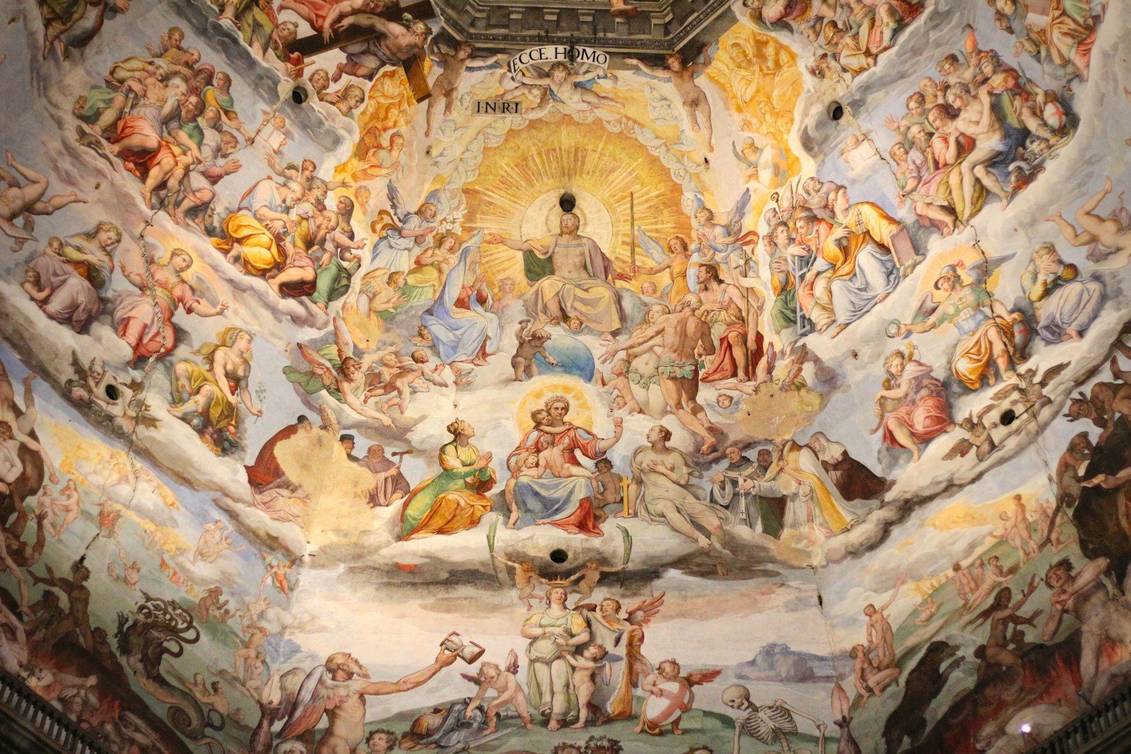 Sistine Chapel Travel Guide a painting on the ceiling of a building