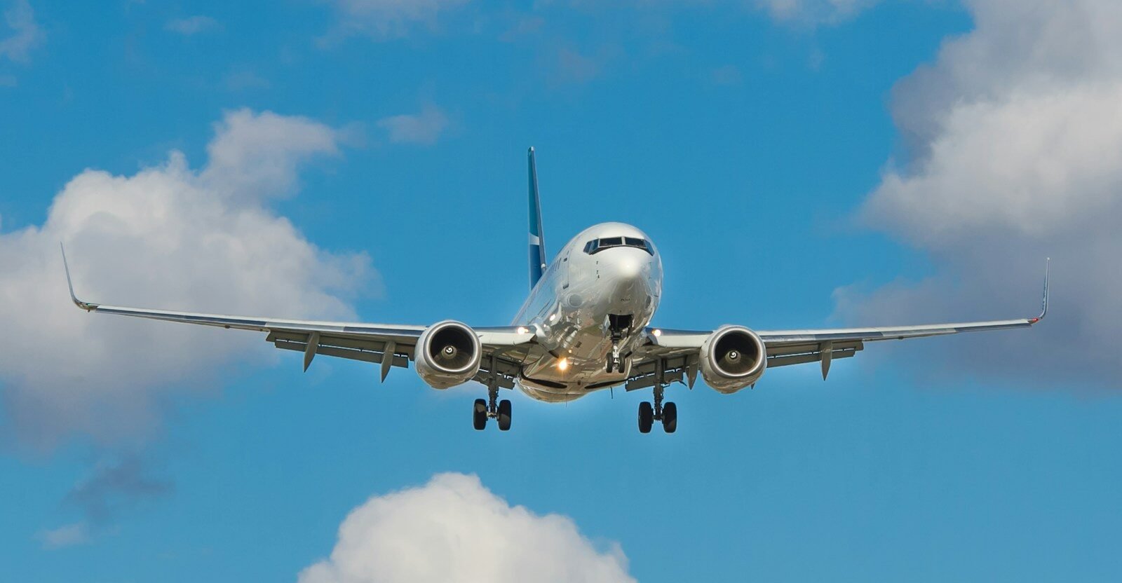 cheaptickets white airplane on mid air