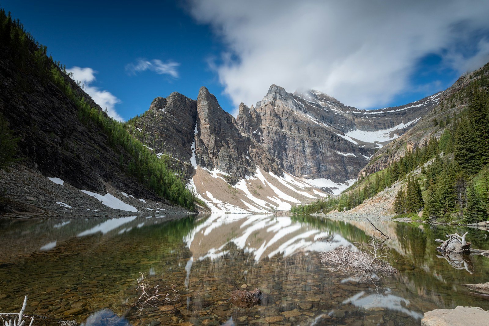 North America Tour Travel Guide mountains under blue sky and white clouds