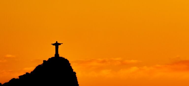 rio de janeiro travel guide silhouette of cross during sunset