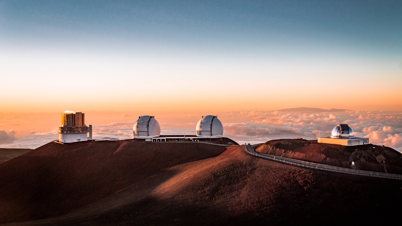 Mauna Kea Summit white tent on brown field during daytime