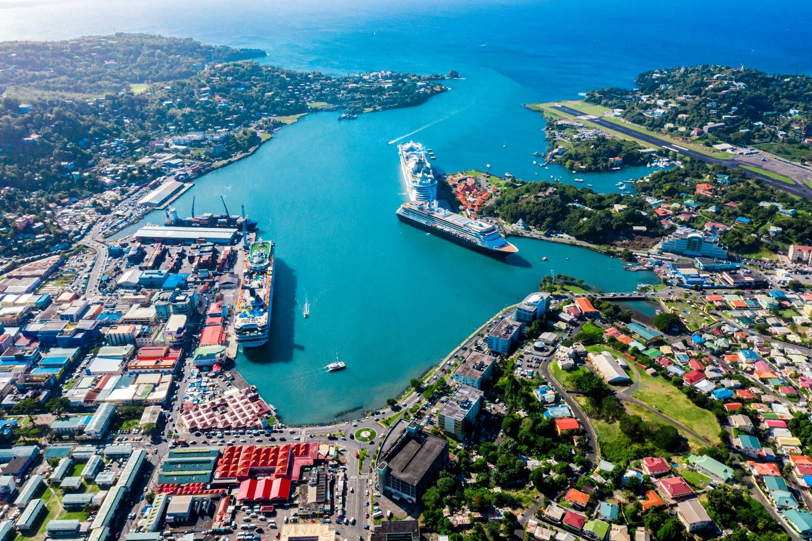 saint lucia travel guide aerial view of city buildings near body of water during daytime