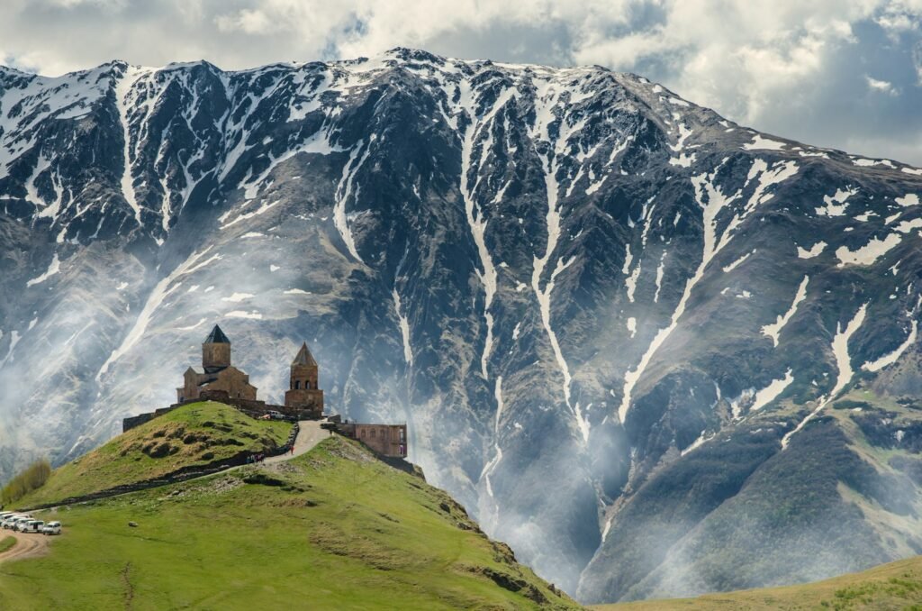 Trinity Gergeti Church, Kazbegi, Georgia
gray concrete building on hill