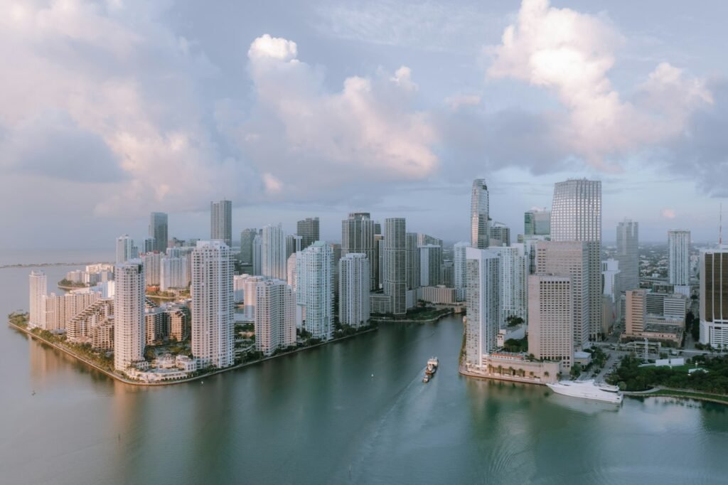 miami travel guide, a large body of water surrounded by tall buildings