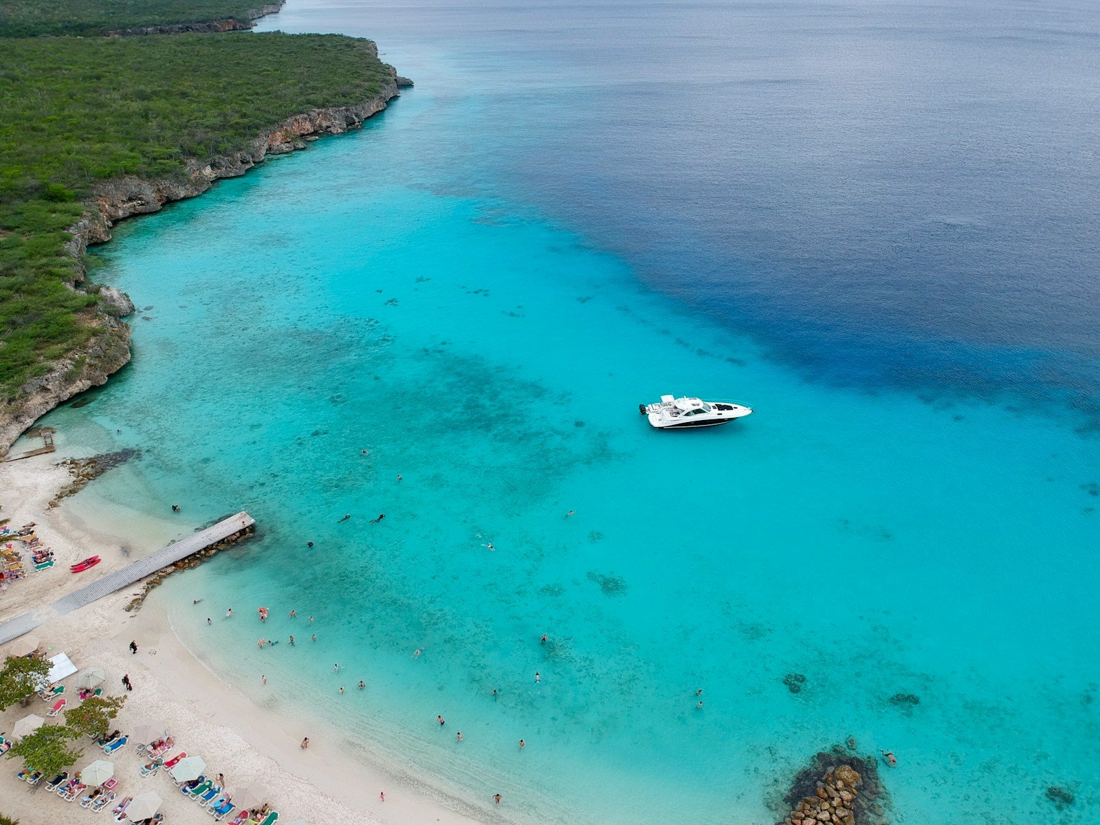 Curacao Travel Guide white boat on blue sea water during daytime