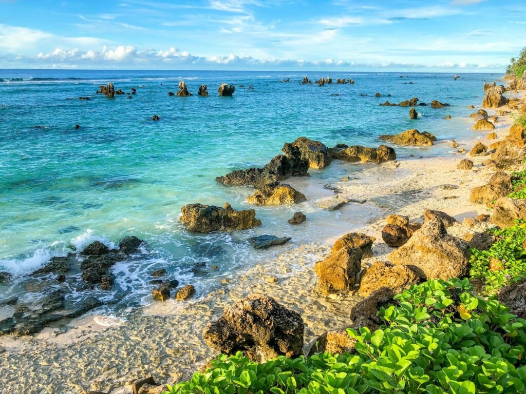 Nauru yaren sea water and rocks by the beach coast during daylight