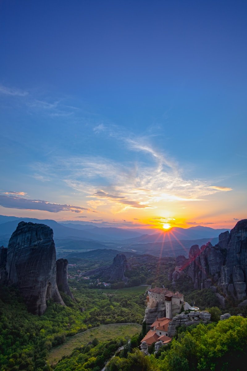 Greece brown rocky mountain under blue sky during daytime