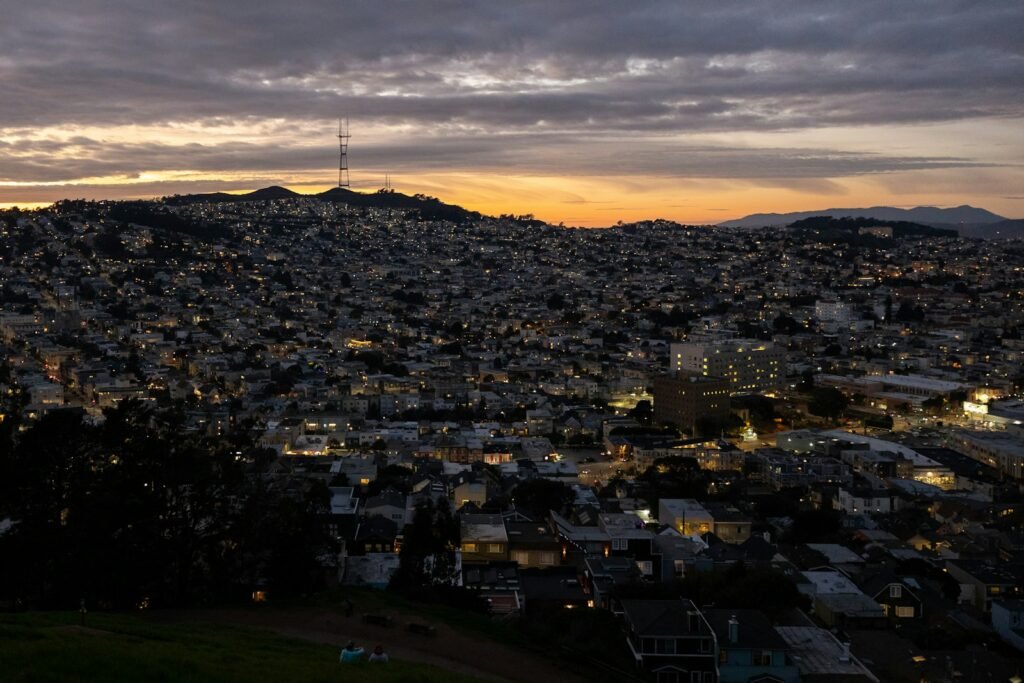 San Francisco Travel Guide 13 a view of a city at sunset