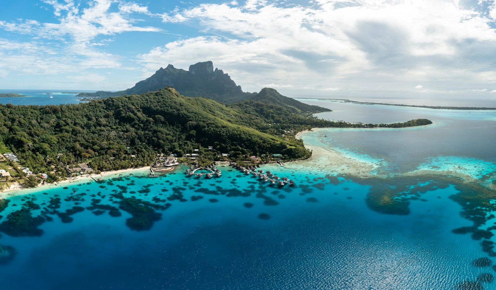 oceania tour travel guide an aerial view of a tropical island in the middle of the ocean