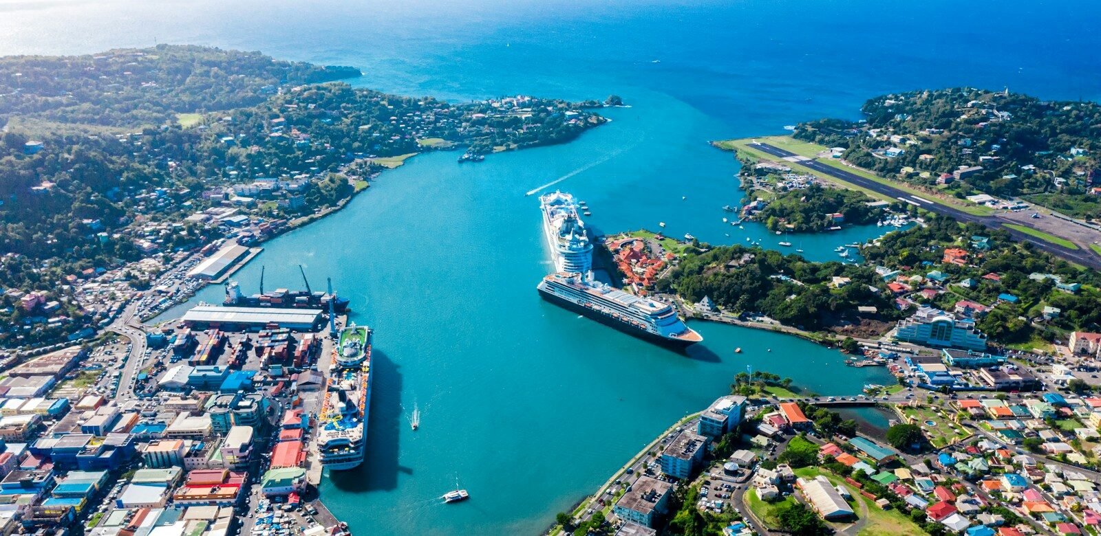 Caribbean Islands Travel Guide aerial view of city buildings near body of water during daytime
