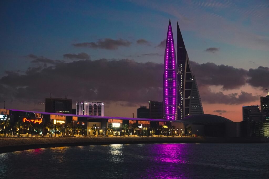 Bahrain World Trade Center, Manama, Bahrain
a very tall building with a purple light on it's side