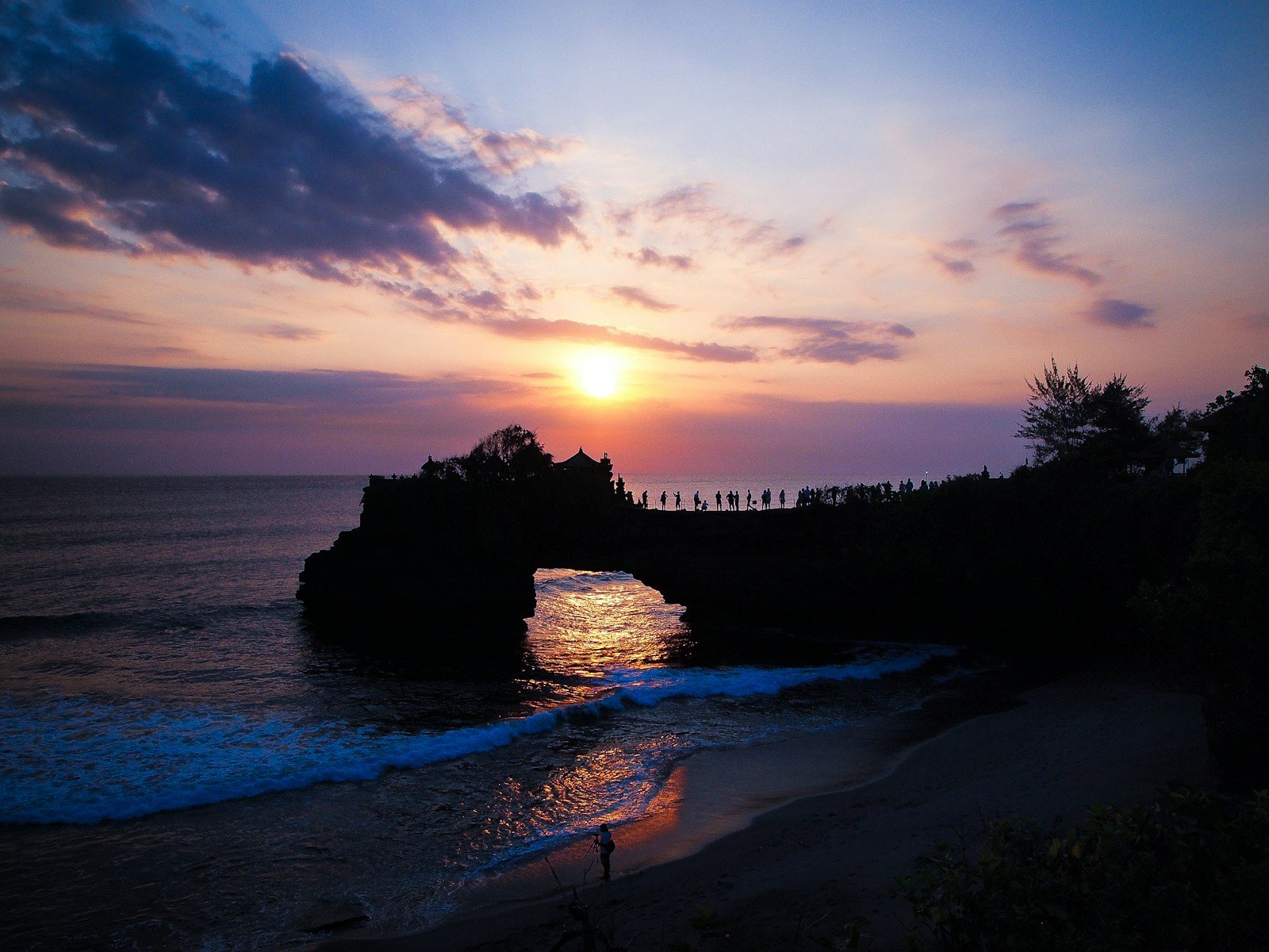 Indonesia Travel Guide landscape photo of a beach at sunset