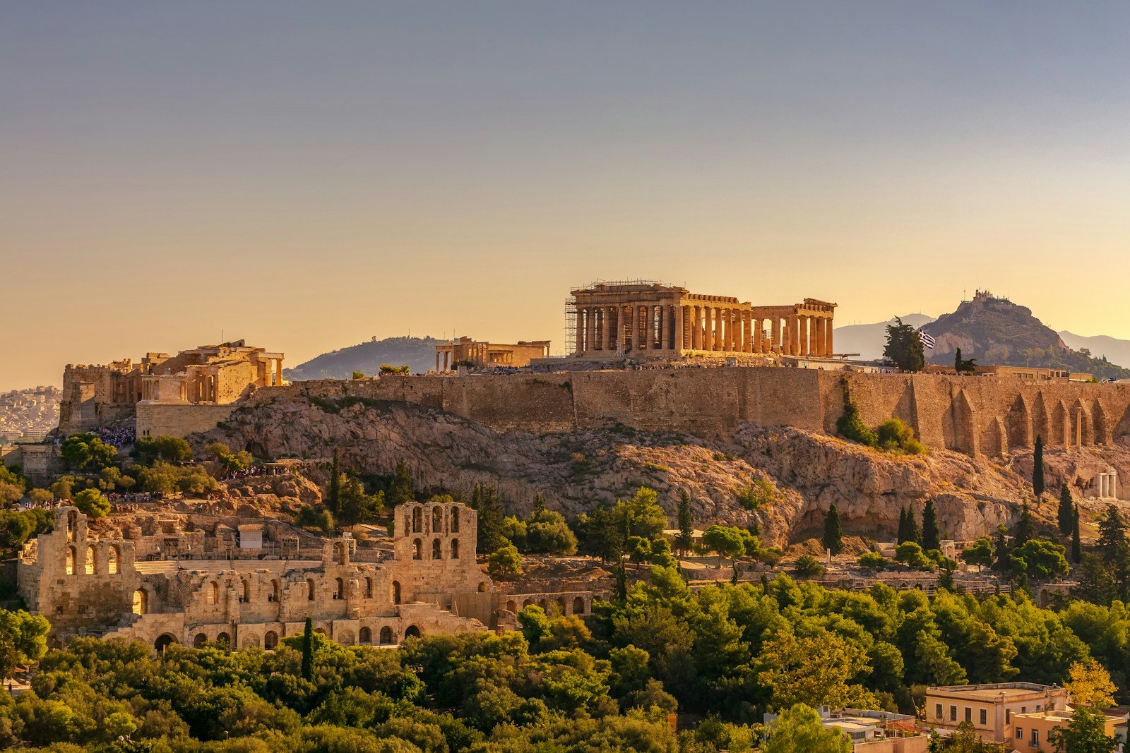 Greece Travel Guide brown concrete building under blue sky during daytime